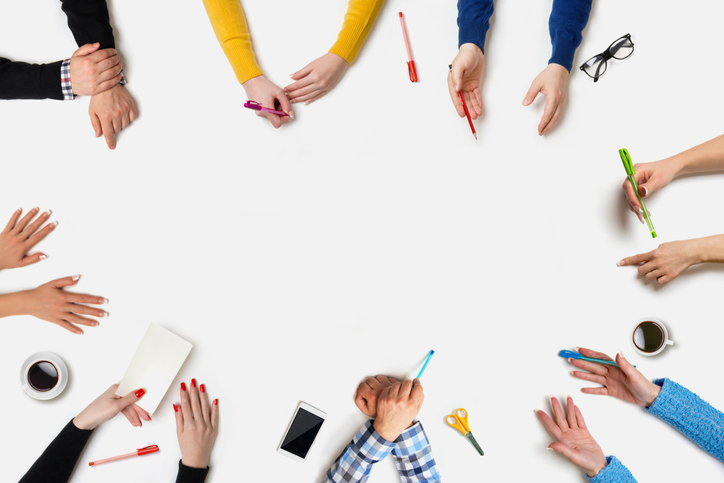 Business people group works at a table – Table Business people group works at a table – Table
